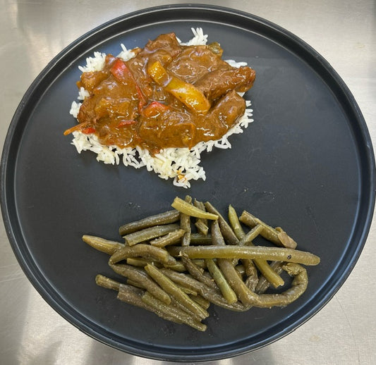 Smothered Beef Sirloin Steak Over Rice with Green Beans